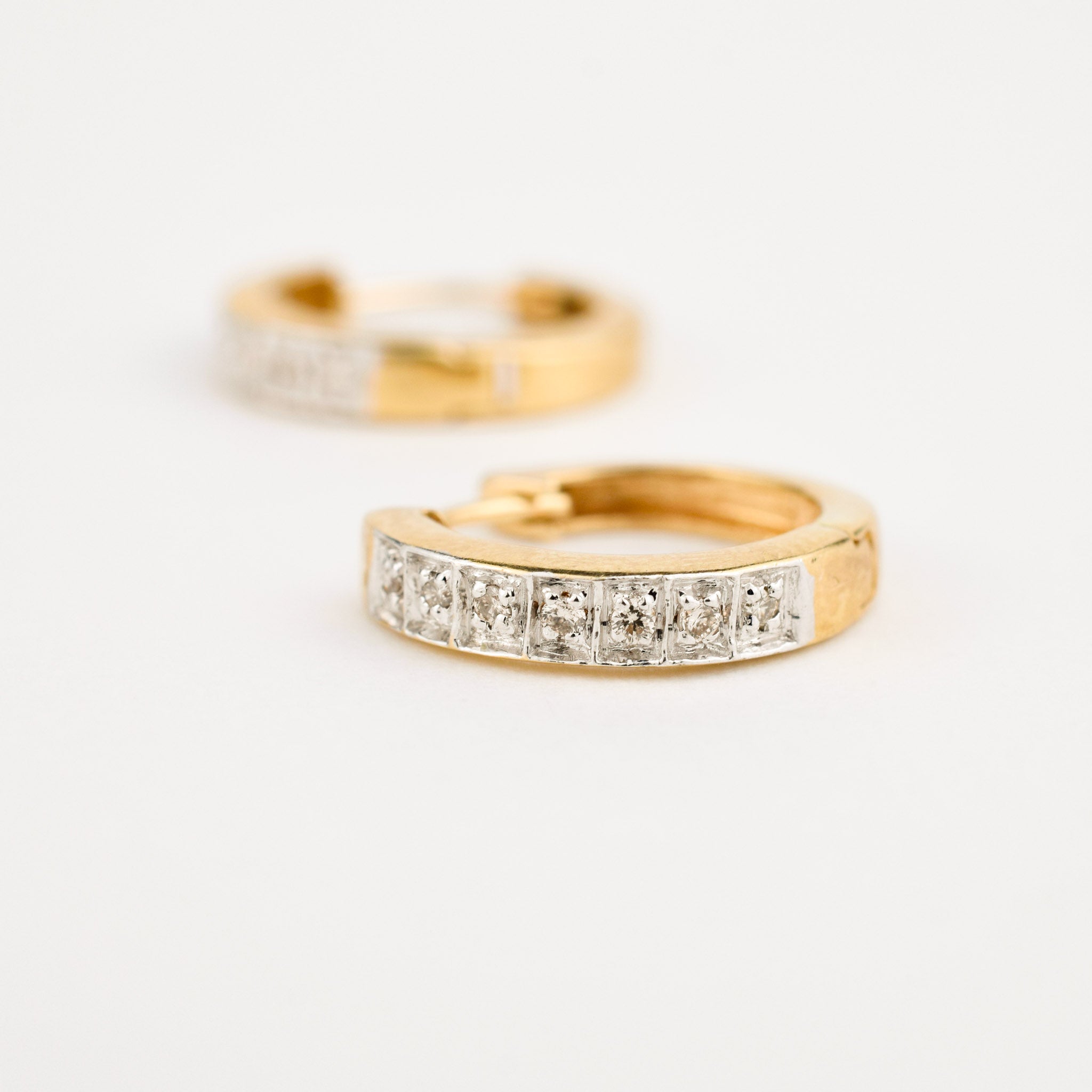 yellow gold diamond huggie hoop earrings