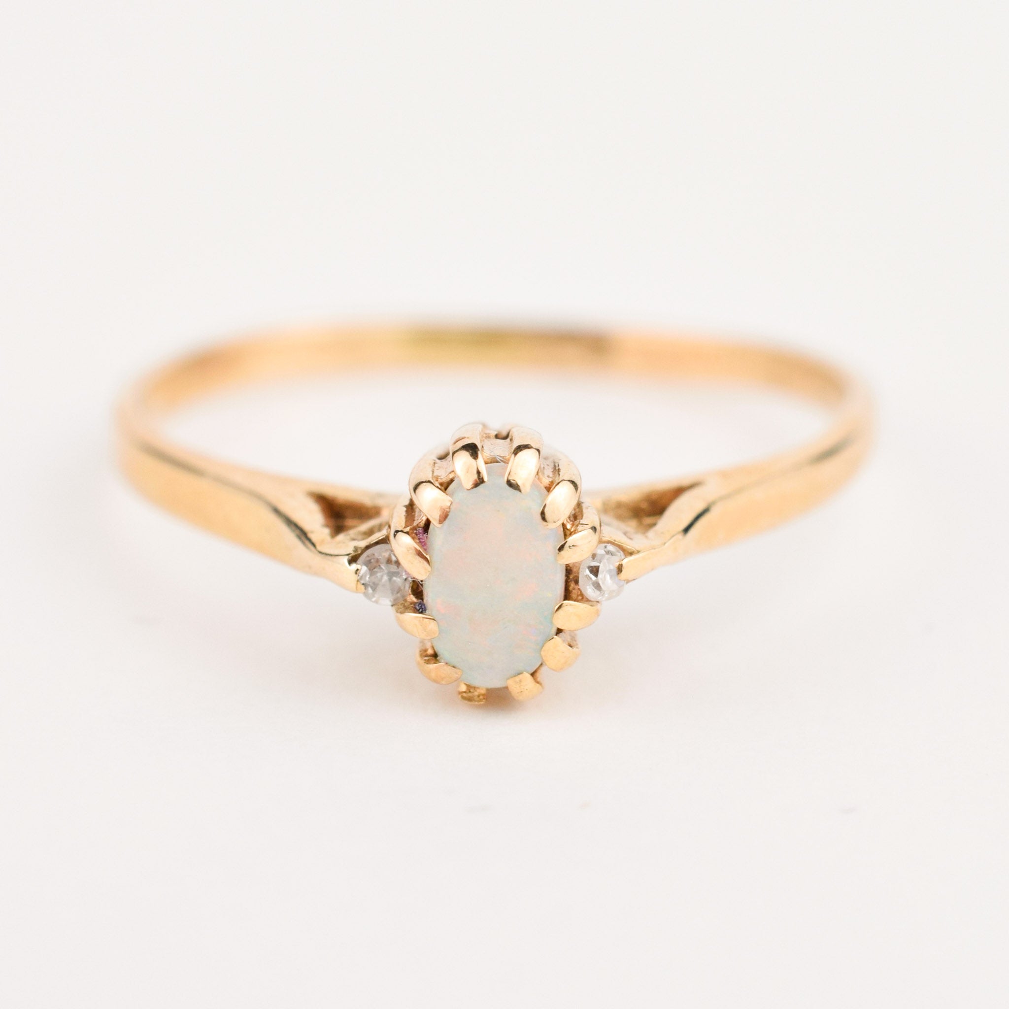 antique dainty opal ring with diamond accents 