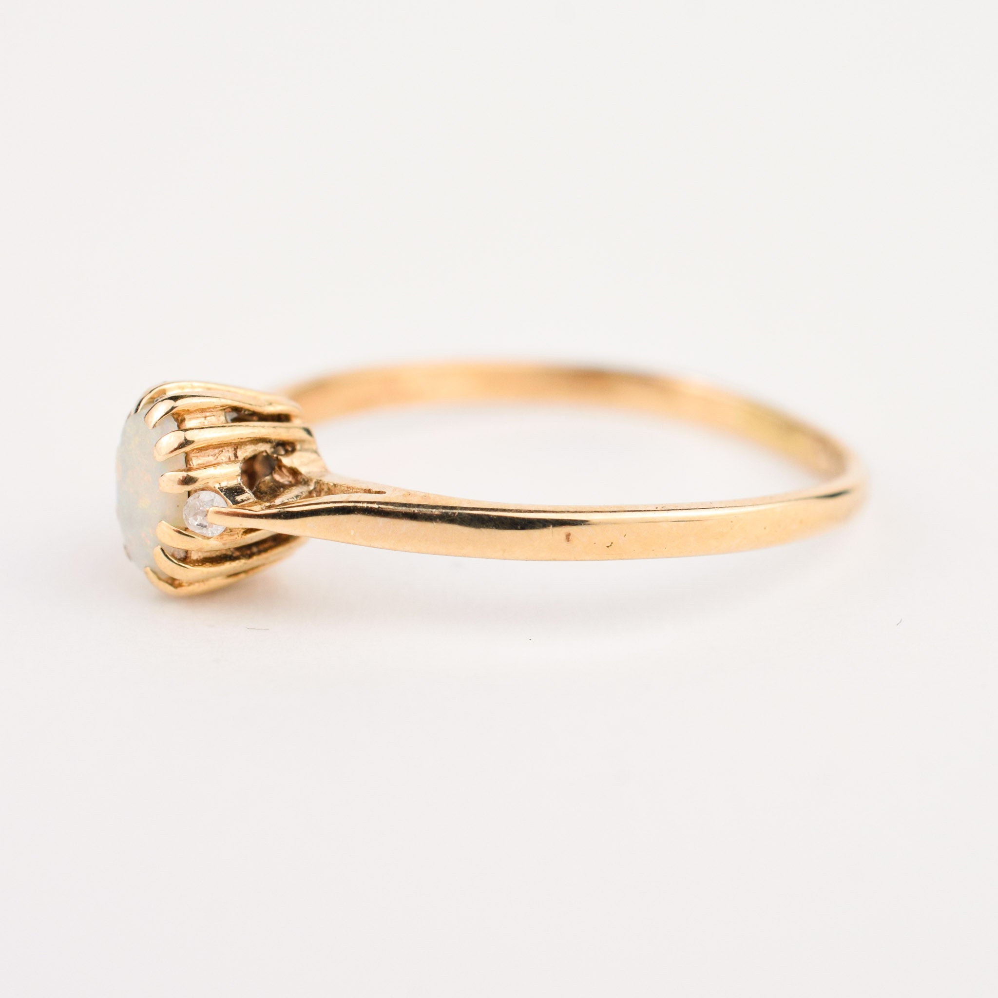 antique dainty opal ring with diamond accents 