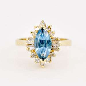 blue topaz and diamond halo ring