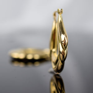 Statement gold hoops for sale, folklor, canada