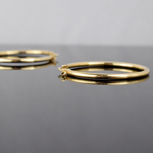 14k yellow gold hoops, folklor